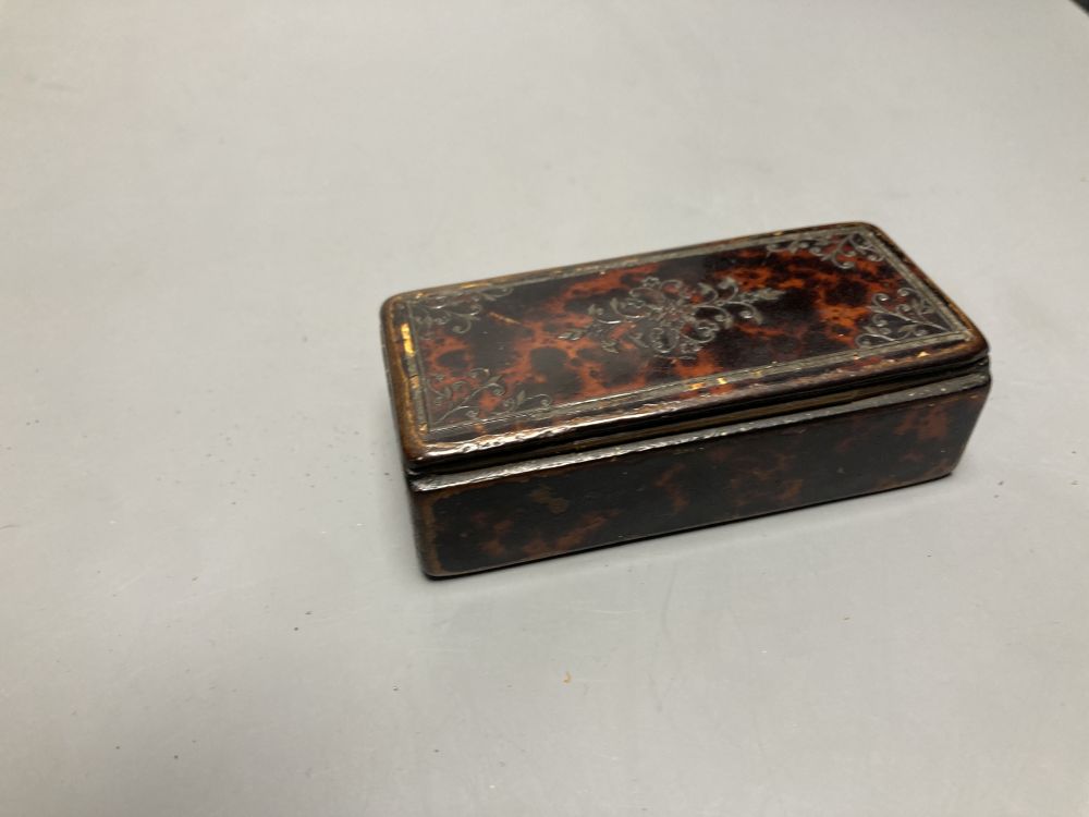 A 19th century papier mache faux tortoiseshell snuff box and a tortoiseshell case containing lace bobbin and needles